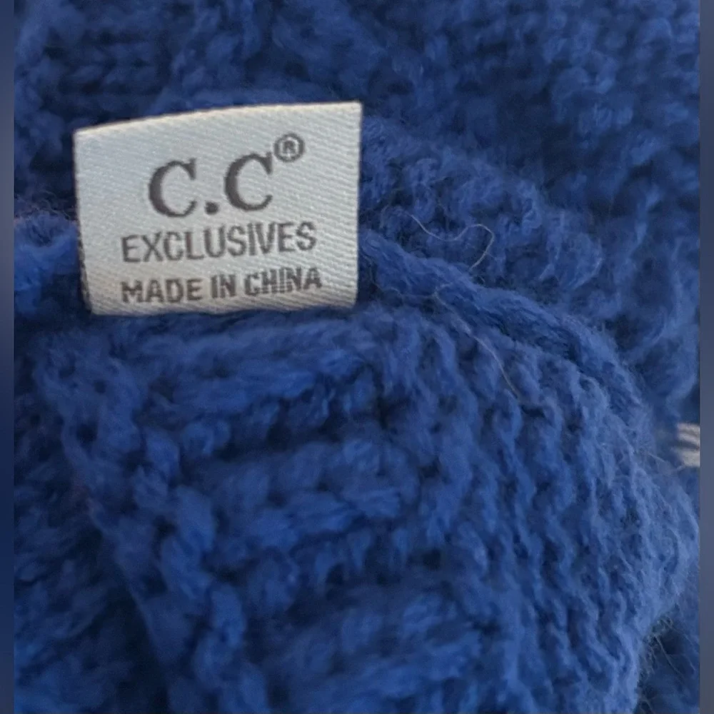 NWOT blue Pompom CC beanie.